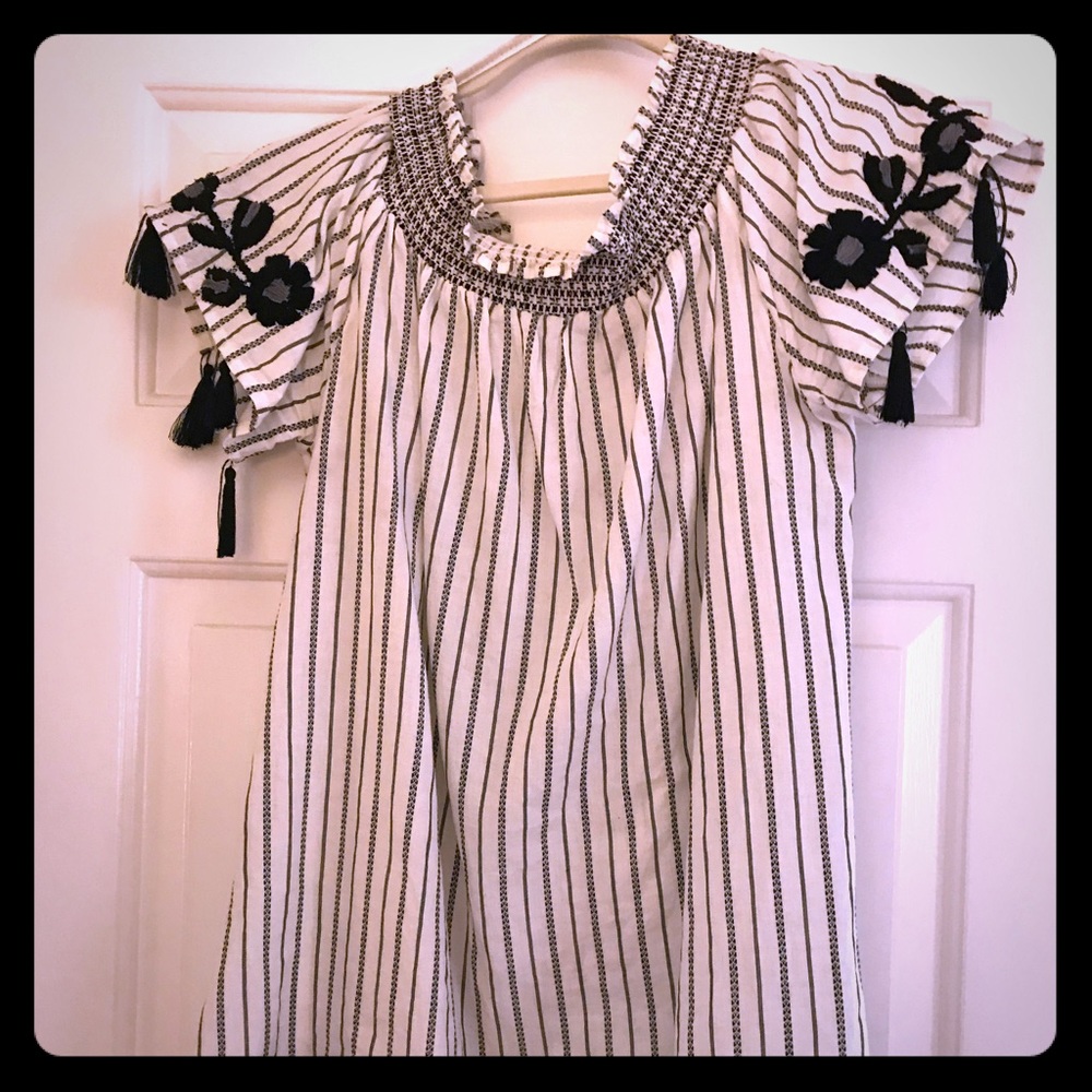 Off shoulder tunic length top